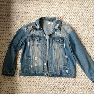 Faded blue ripped jean jacket
